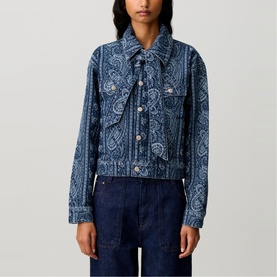 Model wearing Claude Pierlot navy print paisley denim jacket, styled with dark indigo wide-leg jeans