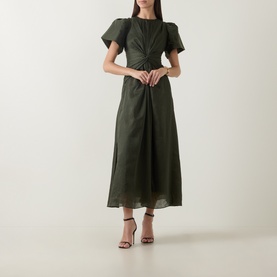 Model wearing Aje dark olive midi dress with puff sleeves, cinched waist, and front slit, styled with brown strappy heels.