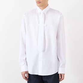 Model wearing Dries Van Noten white cotton casual shirt with contrast placket detail and button fastening, long sleeves.