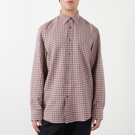 Model wearing Dries Van Noten red cotton check casual shirt with chest pocket and button-front placket, long sleeves.