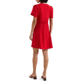 Model wearing Phase Eight red short-sleeve fit-and-flare mini dress, shown from the back, styled with tan flat mules.