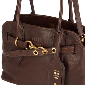 Miu Miu Aventure Aviator Medium Bag in Radica brown leather, gold-tone hardware, belt clasp detail and branded swingtag visible