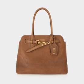 Miu Miu Rovere lambskin tote bag with dual rolled handles, gold-tone hardware and branded luggage tag charm