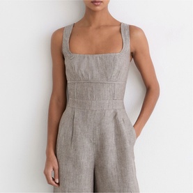 Model wearing Reiss beige linen-look wide-leg jumpsuit with square neckline and thick shoulder straps, cropped view