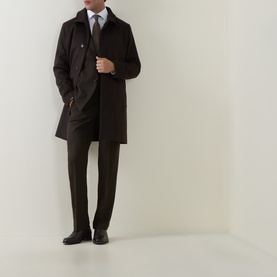 Model wearing Tiger of Sweden 1903 Single-Breasted Blazer in Coffee, styled with matching trousers, white shirt and tie, black shoes