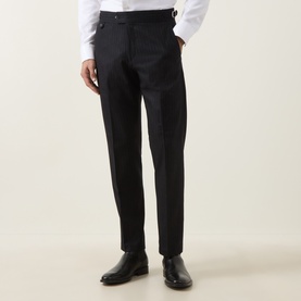 Model wearing Tiger Sweden Blue Funcrion Suit Trousers in slim fit, styled with white shirt and black leather shoes.