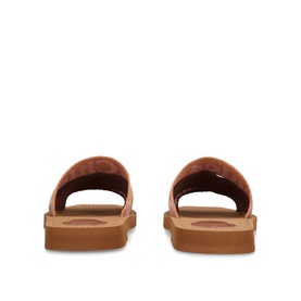 Chloe pink leather slide sandals, rear view, tan gum sole and quilted footbed detail