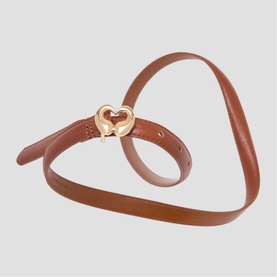 Maje tan leather belt with gold-tone heart-shaped buckle, coiled into a heart shape, punch-hole detail along strap