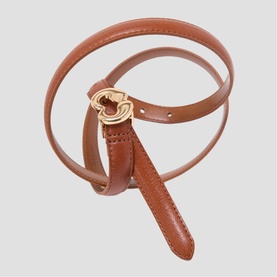 Maje thin tan leather belt with gold-tone interlocking ring buckle, coiled to display full length and hardware detail.