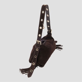 Maje dark brown suede shoulder bag with gold eyelet-studded strap, fringe detail, and gold-tone hardware clasp
