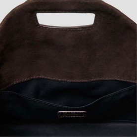 Maje dark brown suede bag interior showing structured top handle and black fabric lining with interior pocket