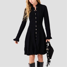 Model wearing Maje Womens French Dress in red, long-sleeve button-front style with ruffle trim, styled with black boots and bag