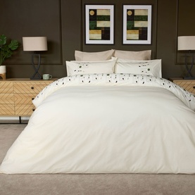 Belledorm Perth Duvet Set in Ivory, 100% cotton, styled on a double bed with geometric embroidered pillowcases in a modern bedroom setting.