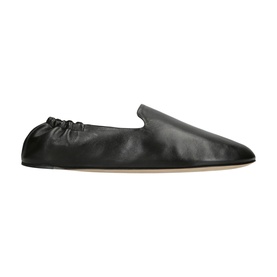 Ganni black leather ballet flat with ruched toe detail and slip-on style, cream rubber sole