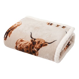 Deyongs beige sherbet-backed throw with Highland cow print, soft plush front and cream fleece reverse visible at corner