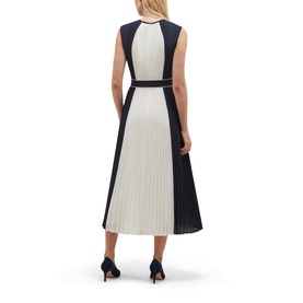 Model wearing Hobbs midnight ivory colourblock sleeveless midi dress with pleated skirt and belt, styled with black heels, rear view