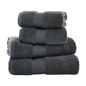 Karla Bree Portobello Towel Carbon, stack of four folded 100% cotton towels in dark charcoal grey