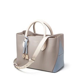 Aspinal of London Sky Blue structured tote bag with cream handles, colour-block panels, gold hardware and adjustable shoulder strap