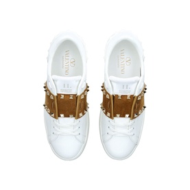 Valentino white leather trainers with beige suede studded strap detail, gold rockstud embellishments, overhead view