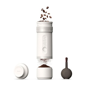 OutIn Fino Portable Electric Coffee Grinder in white, shown disassembled with lid, grinder body, and base, with coffee beans above