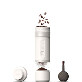 OutIn Fino Portable Electric Coffee Grinder in white, shown disassembled with lid, grinder body, and base, with coffee beans above