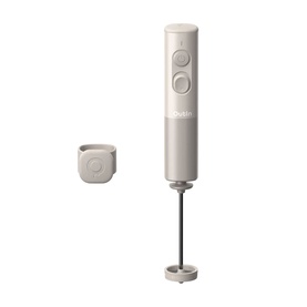 Dualit handheld milk frother in cream/stone, shown with detachable whisk attachment and compact charging base