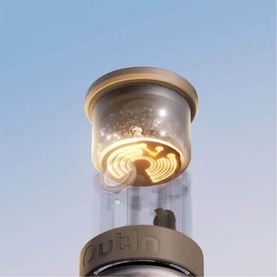 OutIn Mino Portable Espresso Machine Grey, close-up of illuminated heating element inside transparent glass top