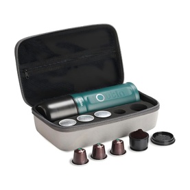 OutIn Nano Portable Espresso Machine Forest Green Bundle with open grey travel case, coffee capsules, and accessories displayed