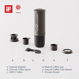 OutIn Nano Portable Espresso Machine in grey, shown with all components: capsule adapter, coffee spoon, USB-C cable, body, filter basket, and shower