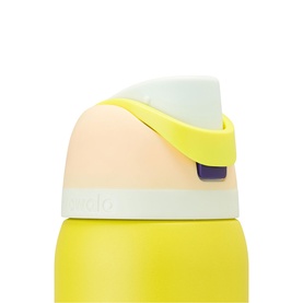 Close-up of Owala water bottle lid in yellow and peach, showing flip-top spout, carry loop, and purple locking button