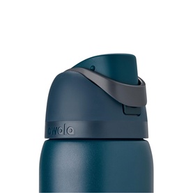 Close-up of Owala water bottle flip-top lid in deep teal blue with dark grey locking mechanism
