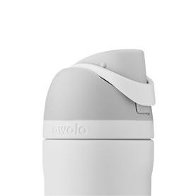 Owala water bottle in light grey, close-up of flip-top lid with carry loop and push-button mechanism visible.