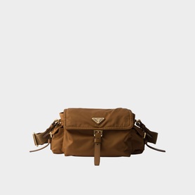Prada Accessories brown nylon shoulder bag with gold-tone triangle logo hardware, front flap pocket and adjustable strap.