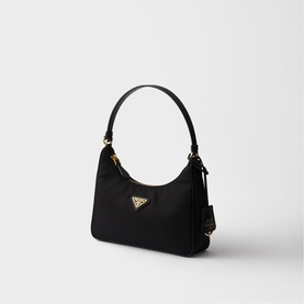 Prada Re-Edition 2000 mini bag in black nylon with gold-tone triangle logo and single top handle