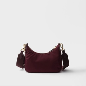 Prada Accessories burgundy nylon crossbody bag with gold-tone hardware, adjustable webbing strap and small pouch attachment