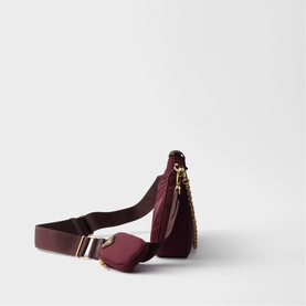 Prada Accessories burgundy nylon crossbody bag with mini pouch, gold-tone hardware, and wide adjustable strap