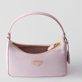 Prada Accessories pink nylon mini shoulder bag with gold-tone hardware, triangle logo plaque, and zip closure