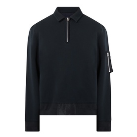 Sacai black cotton-blend half-zip polo sweatshirt with nylon sleeve pocket and ribbed hem, menswear