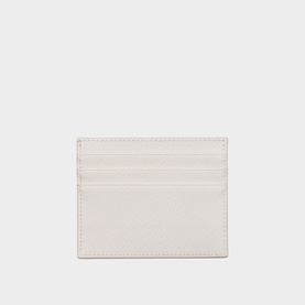 Cream leather card holder with multiple card slots, minimalist design, flat rectangular silhouette