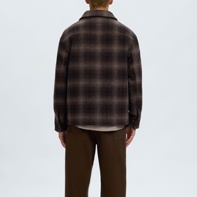 Model wearing Selected Casual Jacket in Delicioso Navy/Grey check, back view, styled with brown trousers