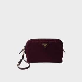 Prada Accessories burgundy nylon cosmetics pouch with gold-tone triangle logo and detachable wrist strap