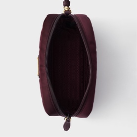 Prada Accessories burgundy pouch, open top view showing interior lining, gold-tone zip with leather puller