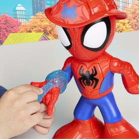 Large Spider-Man action figure in red and blue suit with cowboy hat, child's hand attaching blue web accessory to wrist
