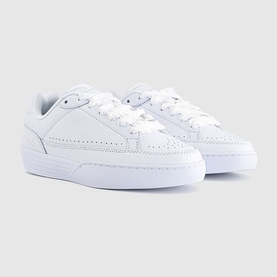 Nike low-top trainers in white leather with perforated swoosh detail, white laces and white sole