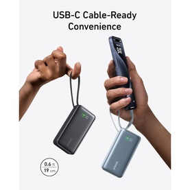 Anker Nano 10000mAh 30W USB-C Power Bank in black, shown in hand charging a phone, with size reference of 19cm