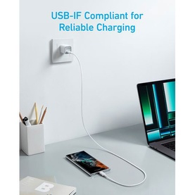 Anker USB Type-C to USB Type-C Cable 0.9m White plugged into wall charger and laptop on a desk