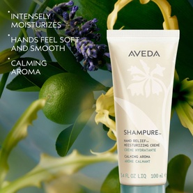 Aveda Shampure Calming Hand Relief Moisturising Cr&egrave;me tube, 100ml, surrounded by lavender and lime botanicals