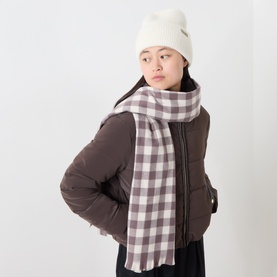 Model with Barbour International Kemora Beanie Hat & Scarf Gift Set in multi; cream fluffy knit beanie and gingham scarf