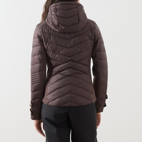 Model wearing Barbour International truffle quilted hooded puffer jacket, back view, styled with black trousers