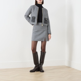 Model wearing Barbour International Halina Gingham Mini Skirt in multi, styled with matching jacket, black turtleneck, sheer tights and dark brown